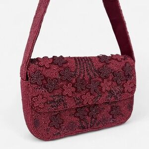 Red/burgundy beaded purse with floral pattern